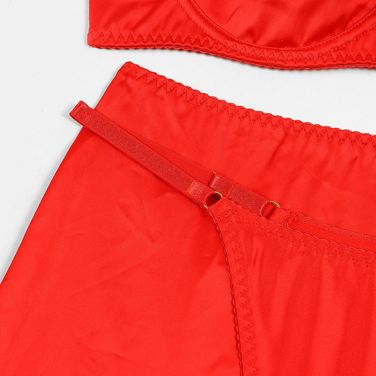 Elegant Four-Piece Lingerie Set with Hip-Covering Skirt